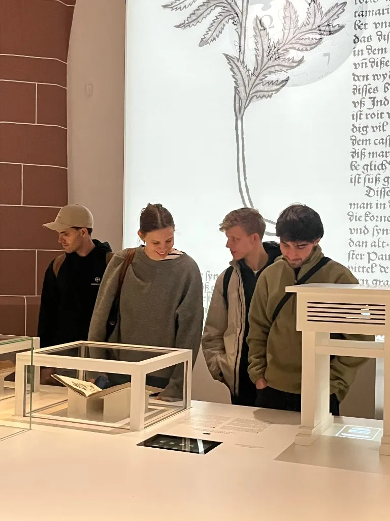 The Capacities team looking at an exhibit during an offsite