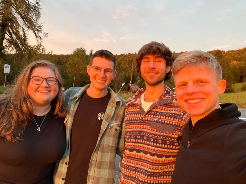 The Capacities team together at sunset during an offsite